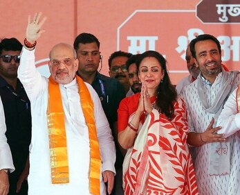 Mathura: Union Home Minister Amit Shah and RLD Chief Jayant Chaudhary at an election campaign rally in support of BJP candidate Hemamalini, in Mathura, Saturday, April 20, 2024. (PTI) Mathura: Union Home Minister Amit Shah and RLD Chief Jayant Chaudhary at an election campaign rally in support of BJP candidate Hemamalini, in Mathura, Saturday, April 20, 2024. (PTI)