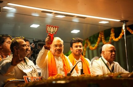 Union home minister Amit Shah with BJP's Bengaluru South candidate Tejasvi Surya and former Karnataka CM BS Yediyurappa during a roadshow for Lok Sabha polls, (PTI) Union home minister Amit Shah with BJP's Bengaluru South candidate Tejasvi Surya and former Karnataka CM BS Yediyurappa during a roadshow for Lok Sabha polls, (PTI)