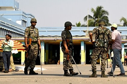 A CBI team along with security personnel during a search in the area on March this year. (Samir Jana/HT Photo) (Hindustan Times)
