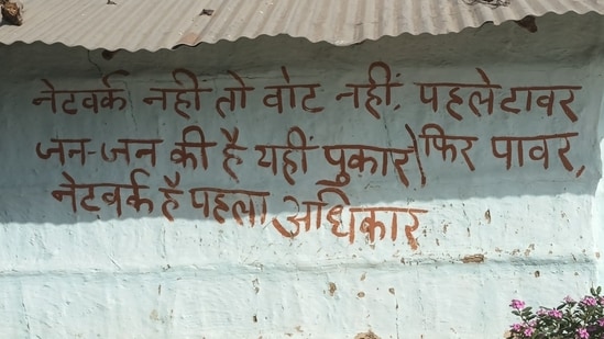 A wall writing in a Bharaich village demanding mobile connectivity. (Gaurav Saigal)