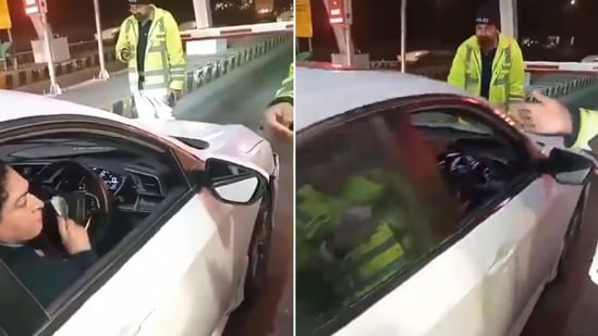 The image shows a woman in conversation with traffic cops. She tried to run over one of them. (Screengrab)