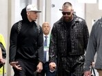 Patrick Mahomes #15 of the Kansas City Chiefs and Travis Kelce #87 are walking through a tunnel as they leave the stadium.(Photo by Steph Chambers / GETTY IMAGES NORTH AMERICA / Getty Images via AFP)