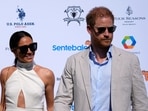 Britain's Prince Harry, right, and wife Meghan Markle, Duchess of Sussex, arrive for the 2024 Royal Salute Polo Challenge to Benefit Sentebale. (AP Photo/Rebecca Blackwell) Britain's Prince Harry, right, and wife Meghan Markle, Duchess of Sussex, arrive for the 2024 Royal Salute Polo Challenge to Benefit Sentebale. (AP Photo/Rebecca Blackwell)