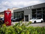 Cars are parked at a Tesla dealership in Berlin Tuesday, April 23, 2024. (Sebastian Christoph Gollnow/dpa via AP) Cars are parked at a Tesla dealership in Berlin Tuesday, April 23, 2024. (Sebastian Christoph Gollnow/dpa via AP)