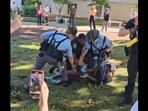 A video shows cops tasing a restrained anti-Israel protester at Emory University (@JoshuaPHilll/X) A video shows cops tasing a restrained anti-Israel protester at Emory University (@JoshuaPHilll/X)