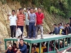 Voters on their way to polling station to cast their votes via boat for the second phase of Lok Sabha Polls at Korbuk in East Tripura on Friday. (ANI) Voters on their way to polling station to cast their votes via boat for the second phase of Lok Sabha Polls at Korbuk in East Tripura on Friday. (ANI)