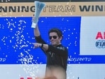 Jay Penske celebrates on podium during the Hyderabad E-Prix last year