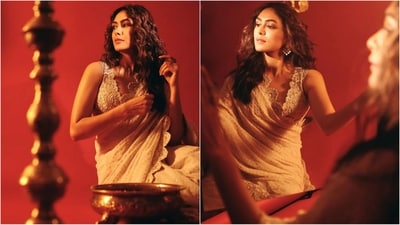 Assisted by celebrity fashion stylist Sheefa Gilani, Mrunal kept her accessories to minimum to let her outfit shine and just styled her stunning look with a pair of golden statement earrings, oversized ring adorning her finger and a pair of high heels. (Instagram/@mrunalthakur) Assisted by celebrity fashion stylist Sheefa Gilani, Mrunal kept her accessories to minimum to let her outfit shine and just styled her stunning look with a pair of golden statement earrings, oversized ring adorning her finger and a pair of high heels. (Instagram/@mrunalthakur)