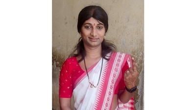 A transgender voter shows her ink-marked finger after voting at a polling station in Kolar, Karnataka. (ANI) A transgender voter shows her ink-marked finger after voting at a polling station in Kolar, Karnataka. (ANI)
