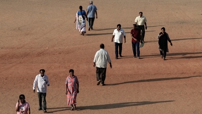Voters arrive to cast their vote in Bengaluru, Karnataka. (Navesh Chitrakar / Reuters) Voters arrive to cast their vote in Bengaluru, Karnataka. (Navesh Chitrakar / Reuters)