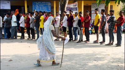 An elderly voter arrives at a polling booth to cast her ballot in Morigaon, Assam on Friday. (PTI Photo) An elderly voter arrives at a polling booth to cast her ballot in Morigaon, Assam on Friday. (PTI Photo)