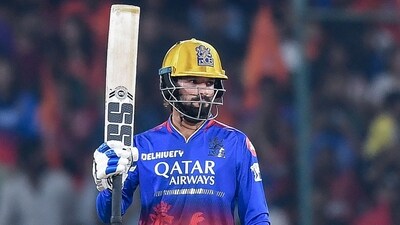 Royal Challengers Bengaluru's Rajat Patidar celebrates after scoring a half-century (50 runs) during the Indian Premier League (IPL) Twenty20 cricket match between Sunrisers Hyderabad and Royal Challengers Bengaluru (AFP) Royal Challengers Bengaluru's Rajat Patidar celebrates after scoring a half-century (50 runs) during the Indian Premier League (IPL) Twenty20 cricket match between Sunrisers Hyderabad and Royal Challengers Bengaluru (AFP)