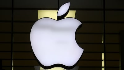 The Apple logo is illuminated at a store in the city center in Munich, Germany. (AP) The Apple logo is illuminated at a store in the city center in Munich, Germany. (AP)
