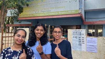 First-time voters show their ink-marked finger after casting votes at a polling station in Bengaluru on Friday. (CEO Karnataka - X) First-time voters show their ink-marked finger after casting votes at a polling station in Bengaluru on Friday. (CEO Karnataka - X)