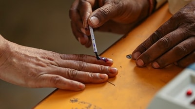 A voter gets his finger marked with indelible ink during voting for the second phase of Lok Sabha elections. (PTI file photo) A voter gets his finger marked with indelible ink during voting for the second phase of Lok Sabha elections. (PTI file photo)