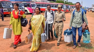 Polling officials leave for election duty on the eve of the second phase of Lok Sabha polls, in Chikkamagaluru, on Thursday. (PTI) Polling officials leave for election duty on the eve of the second phase of Lok Sabha polls, in Chikkamagaluru, on Thursday. (PTI)