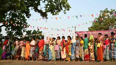 Lok Sabha Election 2024: Voters queue up to cast their ballot outside a polling station during the first phase of voting of India's general election. (AFP) Lok Sabha Election 2024: Voters queue up to cast their ballot outside a polling station during the first phase of voting of India's general election. (AFP)