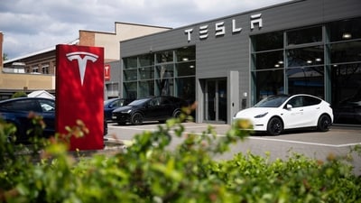 Cars are parked at a Tesla dealership in Berlin Tuesday, April 23, 2024. (Sebastian Christoph Gollnow/dpa via AP) (AP) Cars are parked at a Tesla dealership in Berlin Tuesday, April 23, 2024. (Sebastian Christoph Gollnow/dpa via AP) (AP)