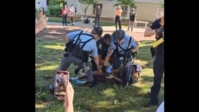 A video shows cops tasing a restrained anti-Israel protester at Emory University (@JoshuaPHilll/X) A video shows cops tasing a restrained anti-Israel protester at Emory University (@JoshuaPHilll/X)