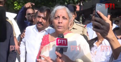 Union Finance Minister Nirmala Sitharaman casts her vote in Bengaluru. (PTI) Union Finance Minister Nirmala Sitharaman casts her vote in Bengaluru. (PTI)