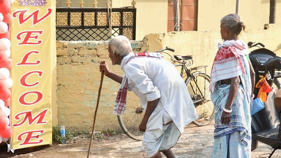 An elderly couple arrives to cast their votes for the second phase of Lok Sabha elections, at Mayong in Morigaon district.(PTI)