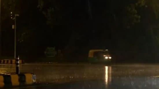 Rain visuals from Firozeshah Road and Kasturba Gandhi Marg in the national capital (ANI)