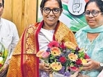 Congress party supporters greet Congress Leader Varsha Gaikwad after she was declared the Mumbai North Central constituency Lok Sabha election 2024 candidate, at the Mumbai Regional Congress Committee office, on Friday. ) (Bhushan Koyande/HT Photo)
