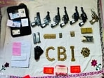 Sandeshkhali: Arms and ammunition recovered from associate of suspended TMC leader Shahjahan Sheikh during CBI's search operation. Sandeshkhali: Arms and ammunition recovered from associate of suspended TMC leader Shahjahan Sheikh during CBI's search operation.