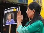 Jailed Delhi Chief Minister Arvind Kejriwal's wife Sunita Kejriwal greets supporters during an election roadshow in support of Aam Aadmi Party's  (AAP) candidate from East Delhi constituency Kuldeep Kumar for the Lok Sabha polls