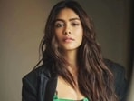 Mrunal Thakur talked about not being comfortable doing intimate scenes. Mrunal Thakur talked about not being comfortable doing intimate scenes.