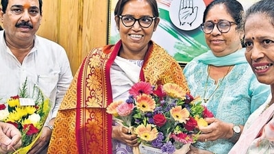 Congress party supporters greet Congress Leader Varsha Gaikwad after she was declared the Mumbai North Central constituency Lok Sabha election 2024 candidate, at the Mumbai Regional Congress Committee office, on Friday. ) (Bhushan Koyande/HT Photo) Congress party supporters greet Congress Leader Varsha Gaikwad after she was declared the Mumbai North Central constituency Lok Sabha election 2024 candidate, at the Mumbai Regional Congress Committee office, on Friday. ) (Bhushan Koyande/HT Photo)