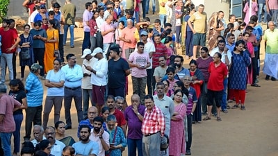 People queue up to vote during the second round of voting in the Lok Sabha elections. (AP) People queue up to vote during the second round of voting in the Lok Sabha elections. (AP)