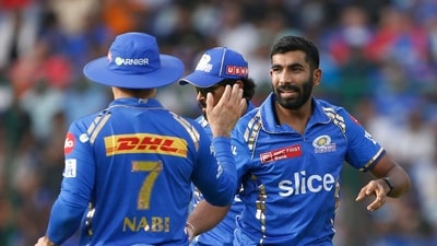Mumbai Indians' Jasprit Bumrah, right, celebrates the wicket of Delhi Capitals' captain Rishabh Pant with his teammate Mohammad Nabi during the Indian Premier League (AP) Mumbai Indians' Jasprit Bumrah, right, celebrates the wicket of Delhi Capitals' captain Rishabh Pant with his teammate Mohammad Nabi during the Indian Premier League (AP)
