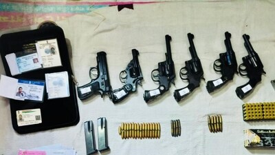 Sandeshkhali: Arms and ammunition recovered from associate of suspended TMC leader Shahjahan Sheikh during CBI search operation in Sandeshkhali. (PTI Photo) Sandeshkhali: Arms and ammunition recovered from associate of suspended TMC leader Shahjahan Sheikh during CBI search operation in Sandeshkhali. (PTI Photo)