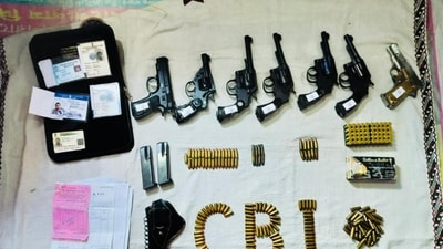 Sandeshkhali: Arms and ammunition recovered from associate of suspended TMC leader Shahjahan Sheikh during CBI's search operation. (PTI) Sandeshkhali: Arms and ammunition recovered from associate of suspended TMC leader Shahjahan Sheikh during CBI's search operation. (PTI)