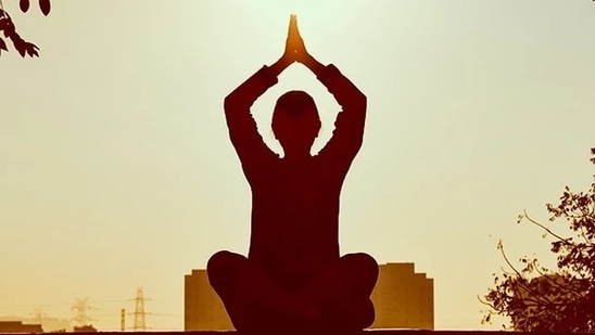 Stretching their fingertips to the reddening sky, hundreds of yoga devotees rolled out their mats on the runway of Bangkok's main airport Saturday. (Representational picture)