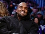 FILE - Kanye West, known as Ye, watches the first half of an NBA basketball game between the Washington Wizards and the Los Angeles Lakers, on March 11, 2022, in Los Angeles. Adidas said Wednesday March 13, 2024 that it's donated or is planning to give away more than $150 million to groups fighting antisemitism and other forms of hate from the sales of Yeezy shoes last year after it severed ties with Ye, the rapper formerly known as Kanye West. (AP Photo/Ashley Landis, File) FILE - Kanye West, known as Ye, watches the first half of an NBA basketball game between the Washington Wizards and the Los Angeles Lakers, on March 11, 2022, in Los Angeles. Adidas said Wednesday March 13, 2024 that it's donated or is planning to give away more than $150 million to groups fighting antisemitism and other forms of hate from the sales of Yeezy shoes last year after it severed ties with Ye, the rapper formerly known as Kanye West. (AP Photo/Ashley Landis, File)
