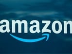 FILE - An Amazon logo appears on an Amazon delivery van in Boston, Oct. 1, 2020. (AP Photo/Steven Senne, File) FILE - An Amazon logo appears on an Amazon delivery van in Boston, Oct. 1, 2020. (AP Photo/Steven Senne, File)
