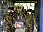 CRPF personnel carrying a coffin containing the body of their colleague, who was killed in a suspected militant attack in the Naranseina area of Bishnupur district, outside a hospital mortuary in Imphal, Manipur, on Saturday. (REUTERS) CRPF personnel carrying a coffin containing the body of their colleague, who was killed in a suspected militant attack in the Naranseina area of Bishnupur district, outside a hospital mortuary in Imphal, Manipur, on Saturday. (REUTERS)