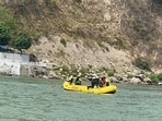 SDRF team searching for two tourists who were washed away in Ganga in Rishikesh on Sunday.