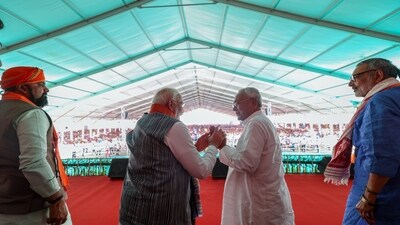 Munger, Apr 26 (ANI): Prime Minister Narendra Modi shares a light moment with Bihar Chief Minister Nitish Kumar during a public meeting for the Lok Sabha polls, as Union Minister for Rural Development and Panchayati Raj Giriraj Singh and State Deputy CM Samrat Chaudhary look on, in Munger on Friday. (ANI Photo) (BJP) Munger, Apr 26 (ANI): Prime Minister Narendra Modi shares a light moment with Bihar Chief Minister Nitish Kumar during a public meeting for the Lok Sabha polls, as Union Minister for Rural Development and Panchayati Raj Giriraj Singh and State Deputy CM Samrat Chaudhary look on, in Munger on Friday. (ANI Photo) (BJP)