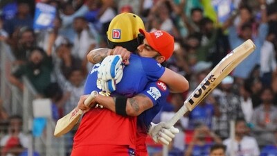 Royal Challengers Bengaluru's Will Jacks and Virat Kohli celebrate during the match against Gujarat Titans. (ANI) Royal Challengers Bengaluru's Will Jacks and Virat Kohli celebrate during the match against Gujarat Titans. (ANI)