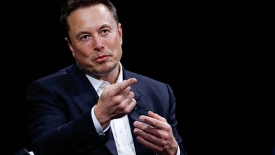 FILE PHOTO: FILE PHOTO: Elon Musk, Chief Executive Officer of SpaceX and Tesla and owner of X, formerly known as Twitter,  gestures as he attends the Viva Technology conference dedicated to innovation and startups at the Porte de Versailles exhibition centre in Paris, France, June 16, 2023. REUTERS/Gonzalo Fuentes/File Photo (REUTERS)