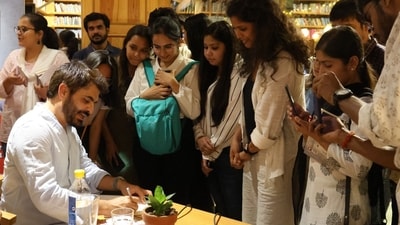Actor-writer Manav Kaul signing books during a session in Lucknow Actor-writer Manav Kaul signing books during a session in Lucknow