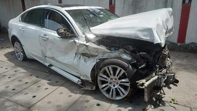New Delhi, India - April 28, 2024: Wrecked remains of a Jaguar car that hit a cab near Dhaula Kuan due to overspeeding, in New Delhi, India, on Sunday, April 28, 2024. (Photo by Hindustan Times ) (HT Photo) New Delhi, India - April 28, 2024: Wrecked remains of a Jaguar car that hit a cab near Dhaula Kuan due to overspeeding, in New Delhi, India, on Sunday, April 28, 2024. (Photo by Hindustan Times ) (HT Photo)