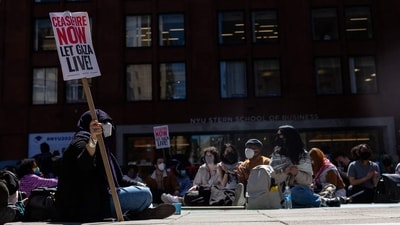 NEW YORK, NEW YORK - APRIL 22: New York University students set up a "Liberated Zone" tent encampment in Gould Plaza at NYU Stern School of Business on April 22, 2024 in New York City. Michael M. Santiago/Getty Images/AFP (Photo by Michael M. Santiago / GETTY IMAGES NORTH AMERICA / Getty Images via AFP) (Getty Images via AFP)