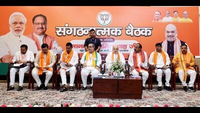 Union Home Minister Amit Shah with others during BJP’s Organizational Meeting, in Kanpur, Sunday (PTI) Union Home Minister Amit Shah with others during BJP’s Organizational Meeting, in Kanpur, Sunday (PTI)