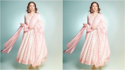 Aditi's look features a mesmerising ivory and masoom gulabi angrakha kalidar anarkali set that captivates with its elegant print. The eye-catching anarkali is crafted in luxurious chanderi silk with resham embroidery. It is paired with a matching pants and a netted dupatta. (Instagram/@aditiraohydari) Aditi's look features a mesmerising ivory and masoom gulabi angrakha kalidar anarkali set that captivates with its elegant print. The eye-catching anarkali is crafted in luxurious chanderi silk with resham embroidery. It is paired with a matching pants and a netted dupatta. (Instagram/@aditiraohydari)