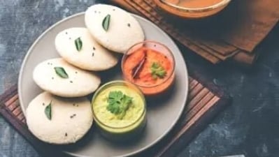 Idli-Sambar (Tamil Nadu): A staple breakfast in Tamil Nadu, Idli-Sambar consists of steamed rice cakes (idli) served with a flavorful lentil-based vegetable stew (sambar) and coconut chutney. This light and nutritious meal is a favourite across South India. (Unsplash) Idli-Sambar (Tamil Nadu): A staple breakfast in Tamil Nadu, Idli-Sambar consists of steamed rice cakes (idli) served with a flavorful lentil-based vegetable stew (sambar) and coconut chutney. This light and nutritious meal is a favourite across South India. (Unsplash)