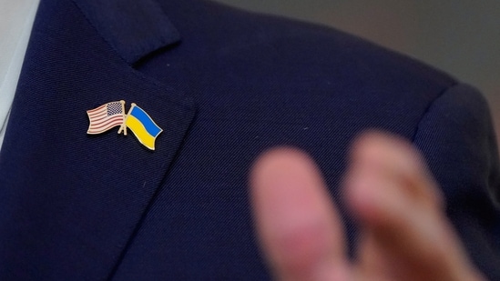 FILE PHOTO: U.S. President Joe Biden wears a pin with U.S. and Ukrainian flags as he speaks after signing into law a bill providing billions of dollars of new aid to Ukraine for its war with Russia, at the White House in Washington, U.S., April 24, 2024. REUTERS/Elizabeth Frantz/File Photo (REUTERS)